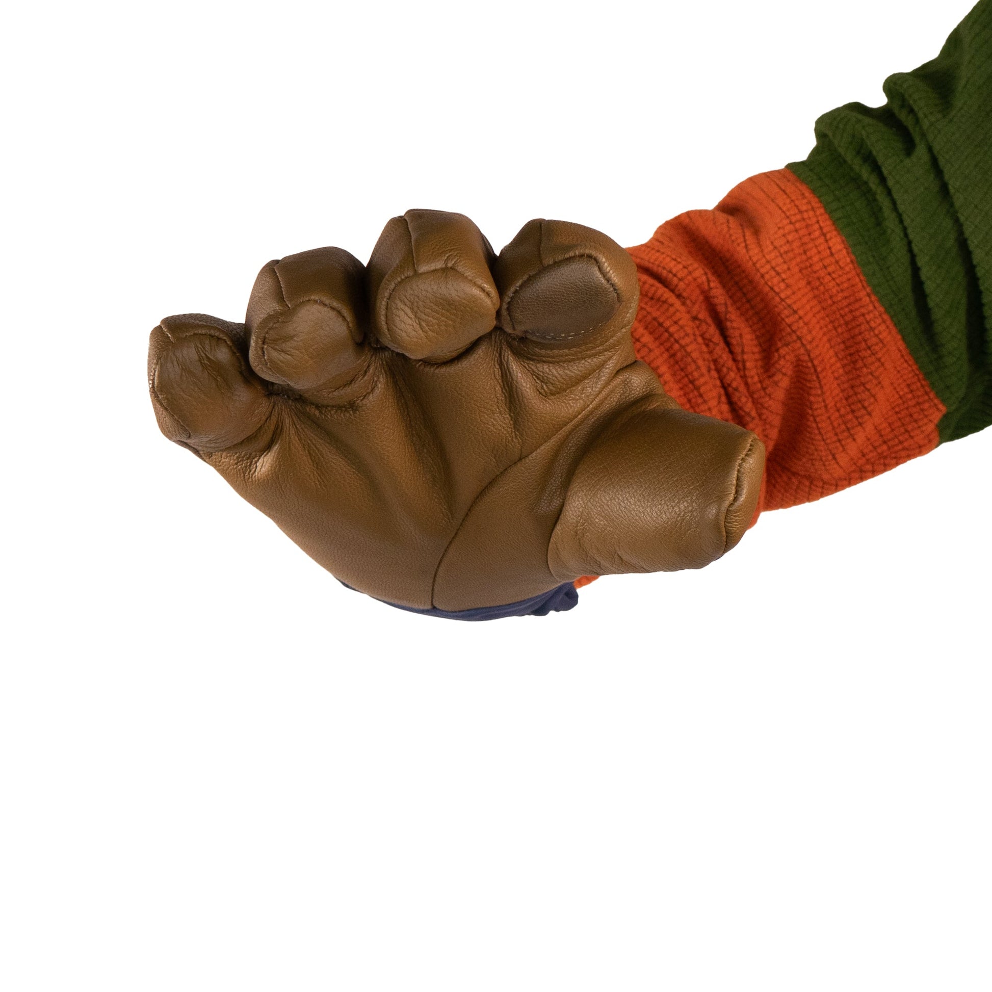 A person wearing an oversized claw-shaped glove from Mainers' Loaf Glove collection, featuring a brown color with an orange and green sleeve.