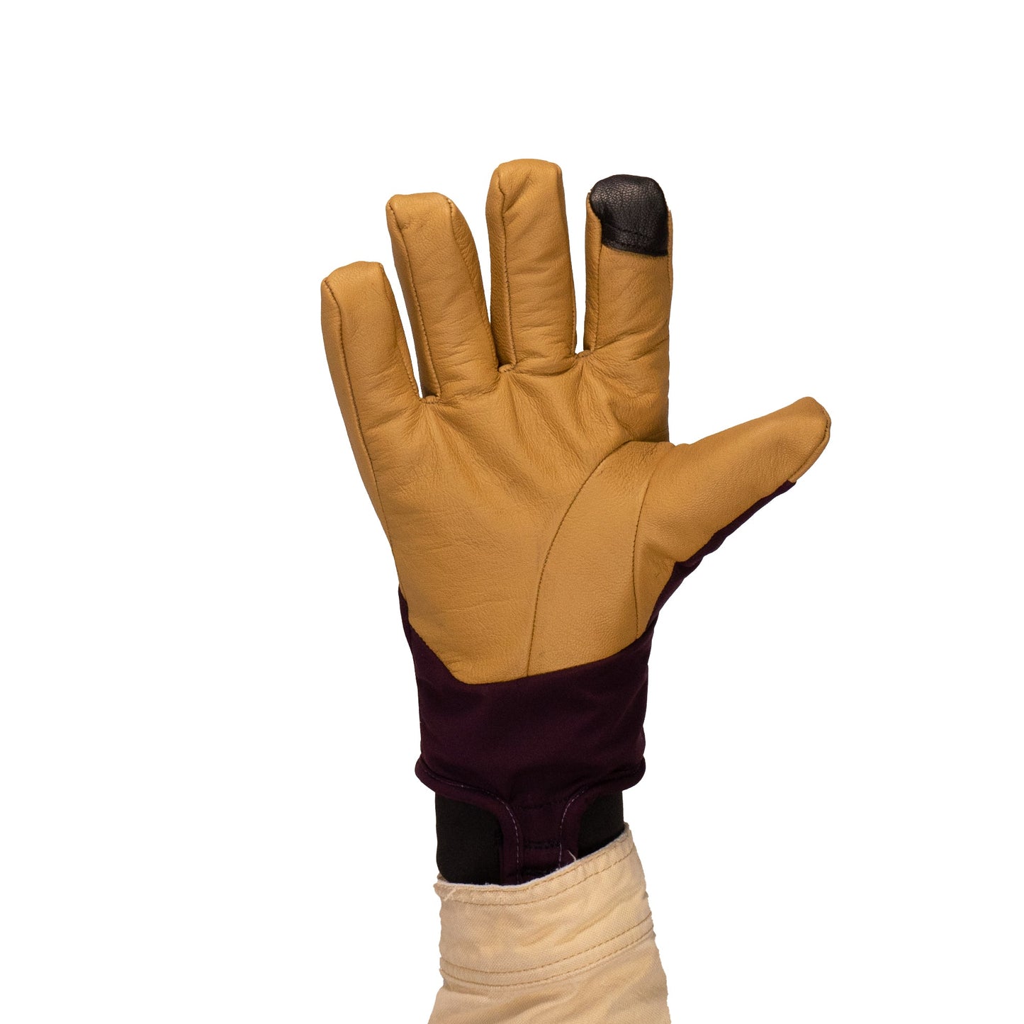 A person sporting the Mainers Loaf Glove, featuring a brown palm and maroon wrist, raises their hand, highlighting its warmth and protection.