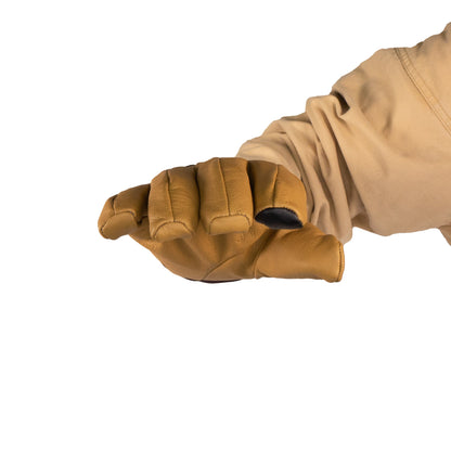 A gloved hand in a fist position, wearing a beige long-sleeve shirt, showcases the warmth and protection provided by the Mainers Loaf Glove.