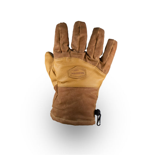 The Mainers MT Battie Glove features brown leather with visible stitching, a logo on the back, and a leather palm for enhanced grip.