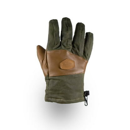 The Mainers MT Battie Glove boasts a waxed canvas and leather palm with a stylish clip, combining ruggedness and function in its green-brown design, shown palm up.