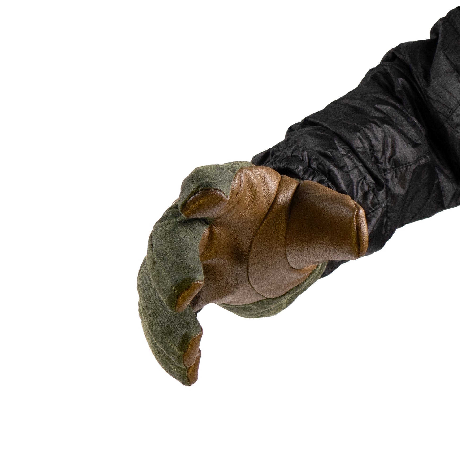 A person in a black jacket extends a gloved hand showing the durable leather palm of Mainers' MT Battie Glove, which has a green fabric back.