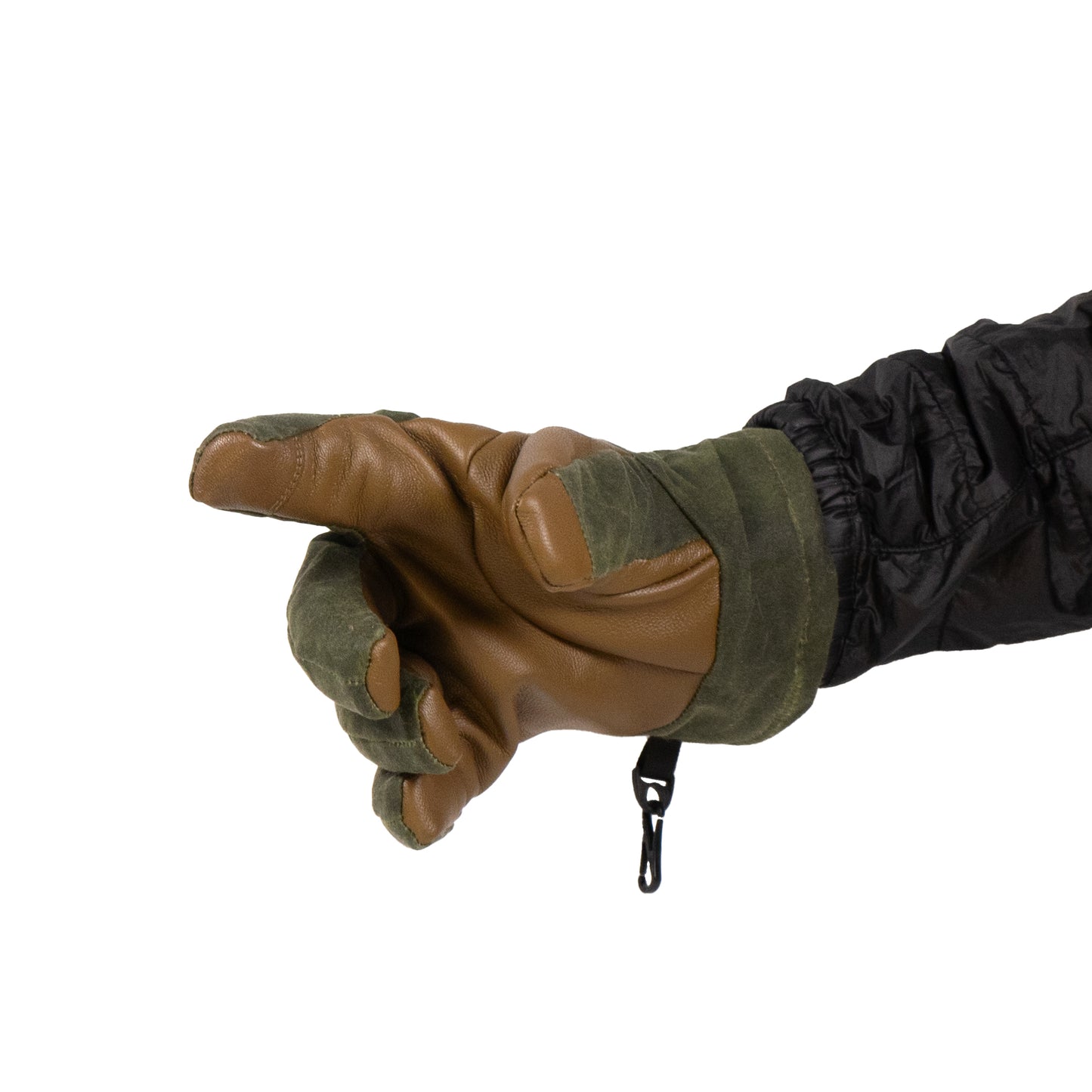 A right hand in a Mainers MT Battie Glove with a green and brown waxed canvas top and durable leather palm points sideways against a white background, paired with a black sleeve.