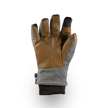 The Ragged MT Glove by Mainers boasts a stylish brown and gray design with an adjustable strap, ideal for any winter adventure, providing comfort and functionality.